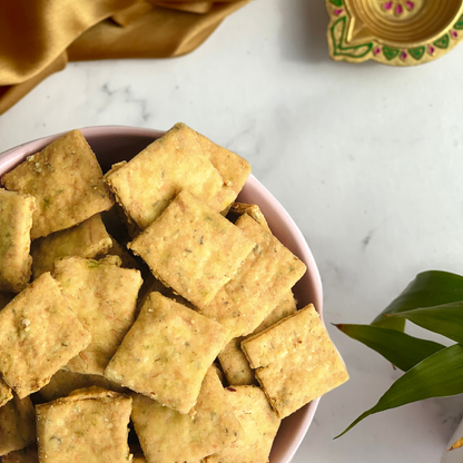 Methi Fenugreek Crackers. Original Healthy Crackers. Healthy Snacks. Savoury snacks taken from a top angle which is bursting with flavour and spice.